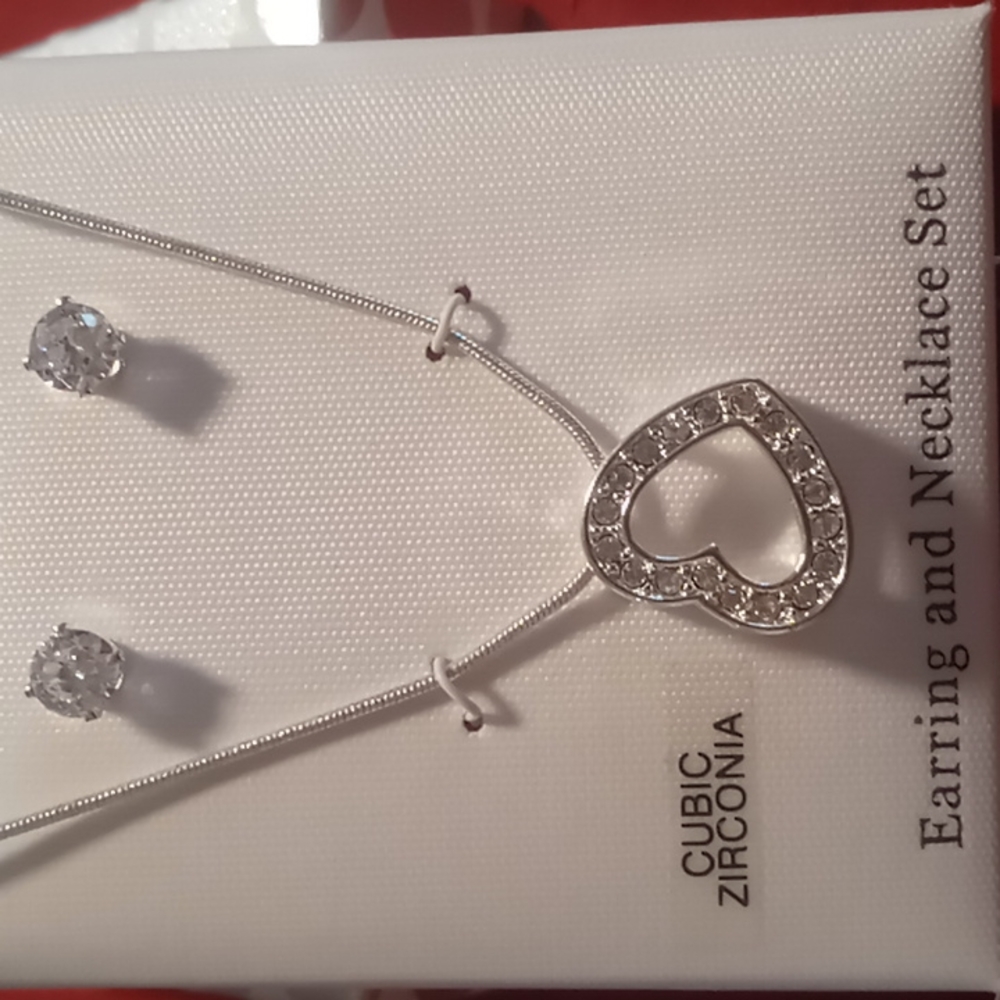 CZ Earrings & Necklace set. Floating heart with stud earrings .22+2 inches long.